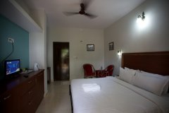 Agonda Palace Resort - Luxury AC Room's bedroom of Agonda Palace on Agonda Beach,Goa - 
