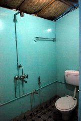 Casa Fiesta Resort  - The attached bathroom of a garden cottage at Casa Fiesta on Patnem Beach, Goa
